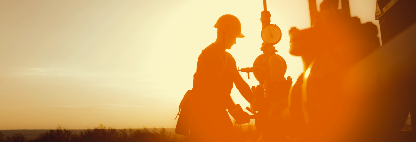 Man drilling oil during sunset. Picture taken for American Exploration & Production Council (AXPC)